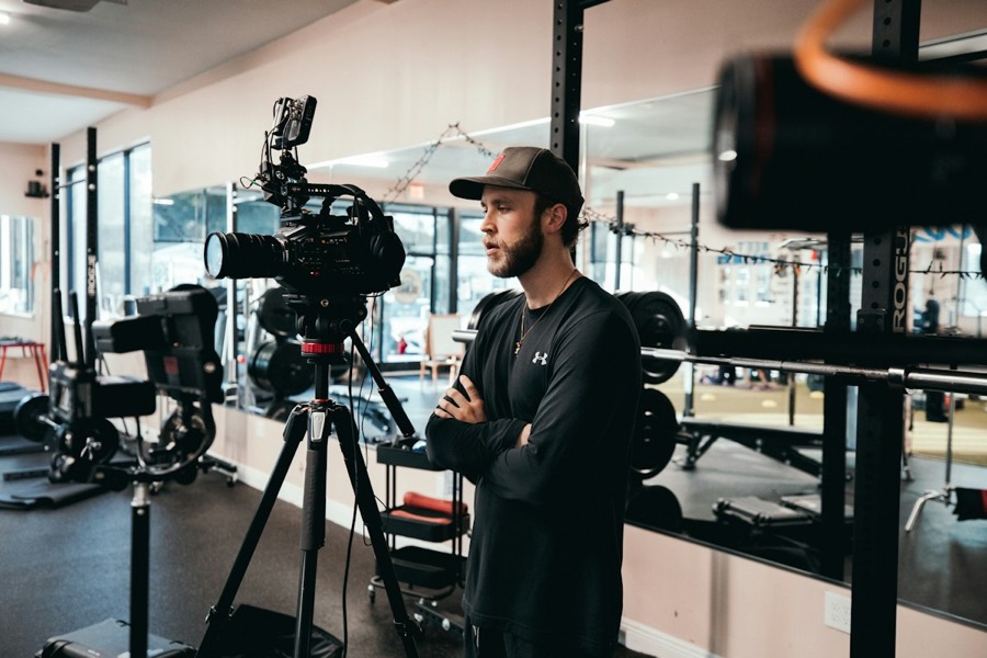 Filming fitness content in the gym
